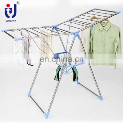 Inside clothes drying garment display rack