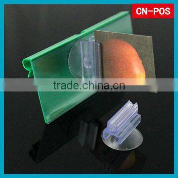 supermarket plastic suction cup displaying holder