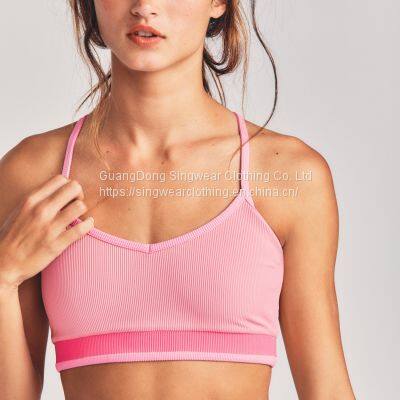 Ladies' santoni seamless knit quick dry & wicking cross back mid support sports bra.