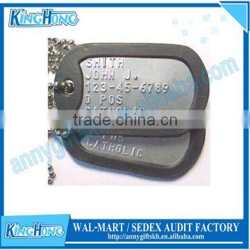 Shiny stainless steel dog tag with rubber silencers