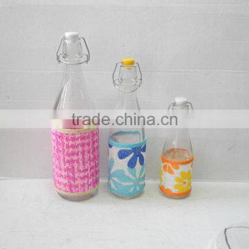 glass milk juice bottle with metal clamp lid and woven belt coating