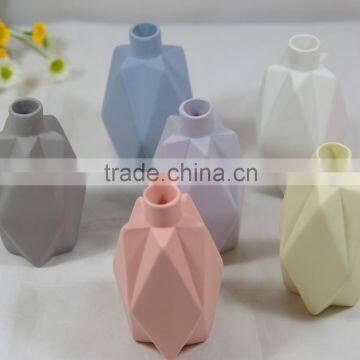 Small ceramic origami flower vase