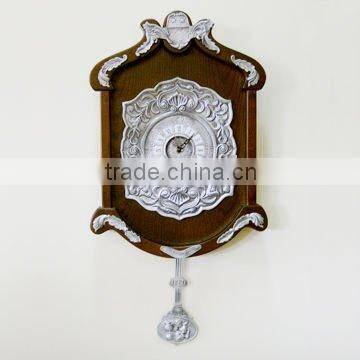 Wooden round wall clock with pewter decorative folower