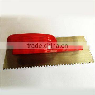 plaster trowel with notch teeth and plastic handle