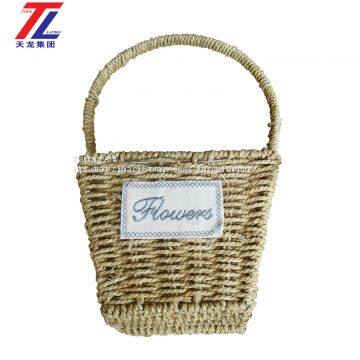 Wholesale Cheap Grass Braid Stitched Natural Gift Straw Basket With Handle photo-2