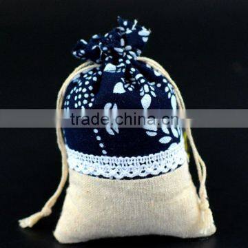 New design small flowers splice free design jute drawstring bag made in china                        
                                                                                Supplier's Choice