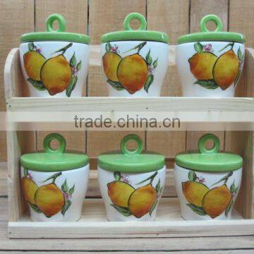 White ceramic 6 pcs of spice canister set with lemon decal in wooden stand