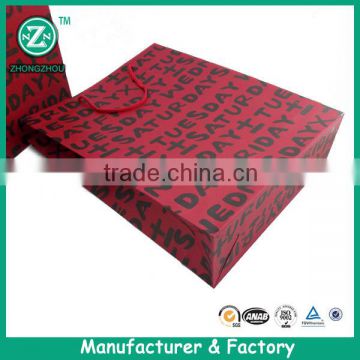 Red background black letter custom top quality paper bag