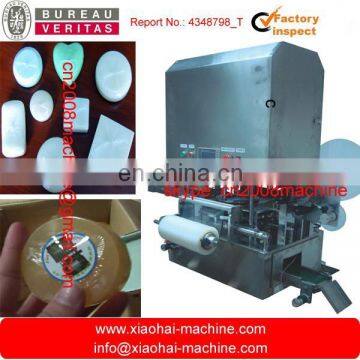 Automatic stretch film packing machine for round soap ( with conveyor belt feeding and labelling funcation)