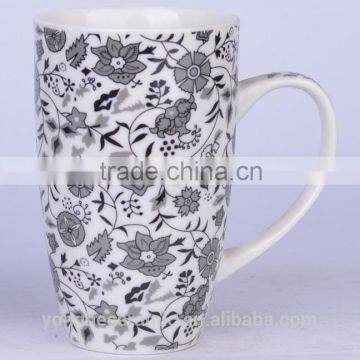 Tall coffee mugs with black and white designs