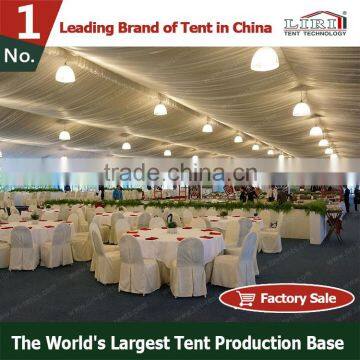 Grand hotel tent hall with decorations for hotel receiption