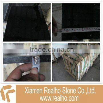 polished black artificial quartz tile