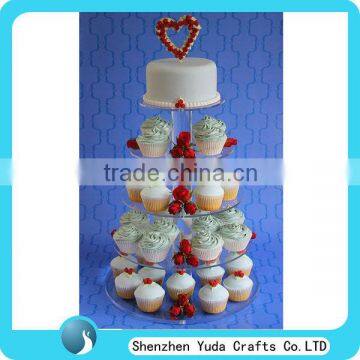 Personalized plexiglass 5 tier wedding cupcake stand with a cake on the top, clear acrylic cake stand