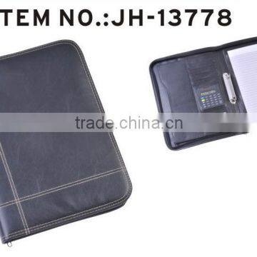 Document folder with 2 ring binders, business portfolio, music folder with caculator