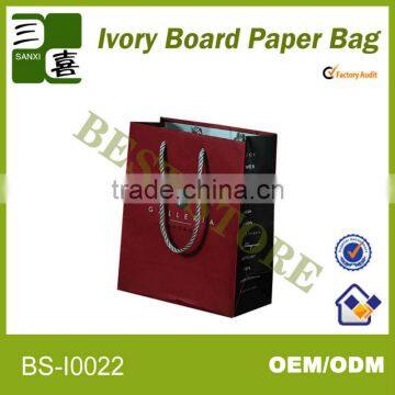 2014 new decrotive design handle shape paper bag