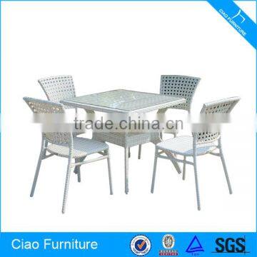 Catering venues white rattan dining table and chair