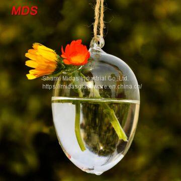 Lovely borosilicate hanging egg shaped glass vase for decoration