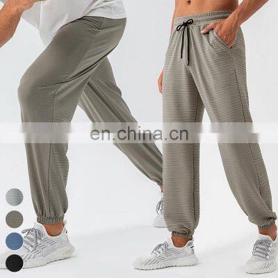 High Quality Breathable Quick Dry Cool Feeling Running Fitness Joggers Drawstring Bunched Casual Loose Trousers Men Jogger Pants
