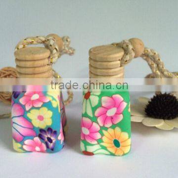 Empty hanging car perfume bottle