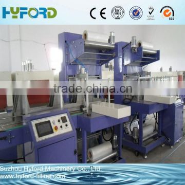 Automatic PET bottle shrink sleeve wrapping machine