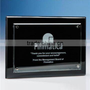 Black wooden plaques with logo engraved for company honor