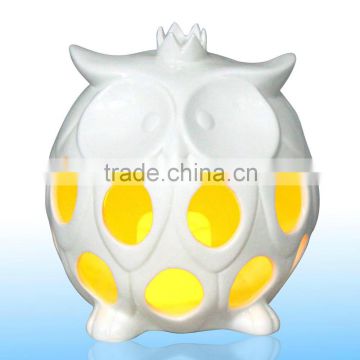 Ceramic owl holder with plastic electric candle for indoor decoration