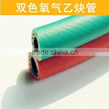 Twin welding red and blue hoses for gas cutting