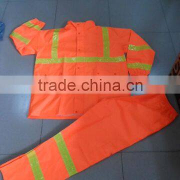 high visibility orange safety rainsuit with yellow plastic tapes