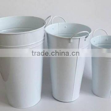 white metal decorative planters