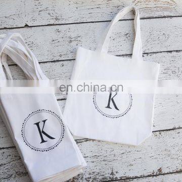 Natural monogrammed canvas tote bridal shower gift bags