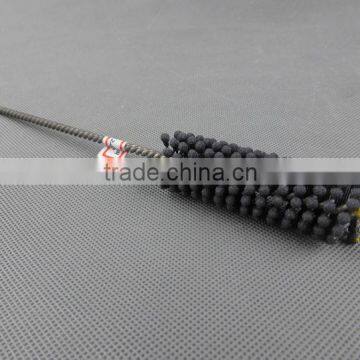 Flexible honing brush