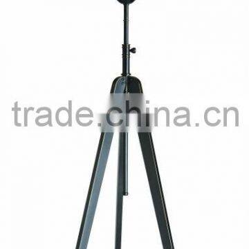 three-legged floor lamp with white fabric shade