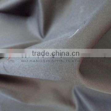 PU coated black peach skin twill fabric