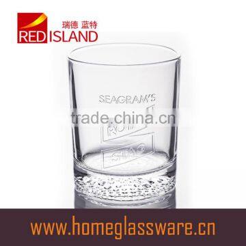 300ml clear glass cup with small bubbles at the bottom and embossed letter for drinking