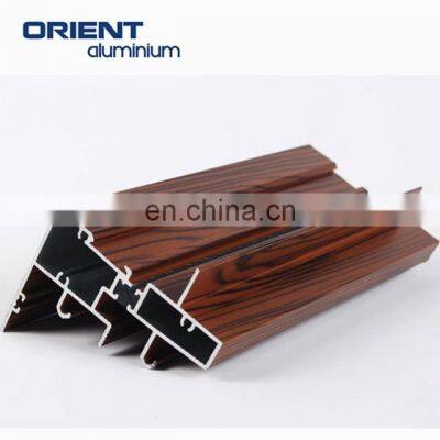 Malaysia Oem/odm Accepted Wholesale Custom Wood Grain Hot Sale Casement Aluminum Spring Door Profile Frame photo-2