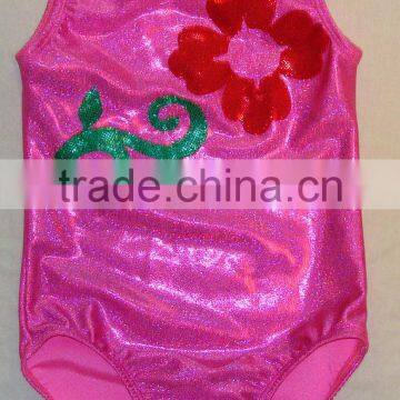 Clearance Gymnastics leotard girl in pink twinkle with red shattered glass holographic flower