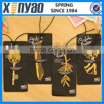 Gold plated metal feather bookmark