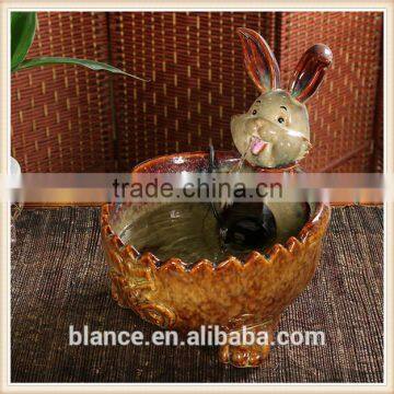 handmade ceramic home fountain in creative rabbit figurine design