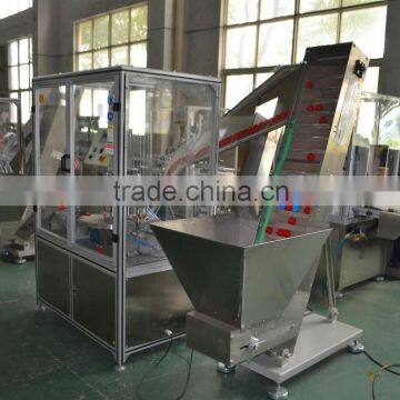 Automatic cap lining insert machine