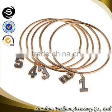 2015 latest Sunshine fashion accessory gold charm bracelets set