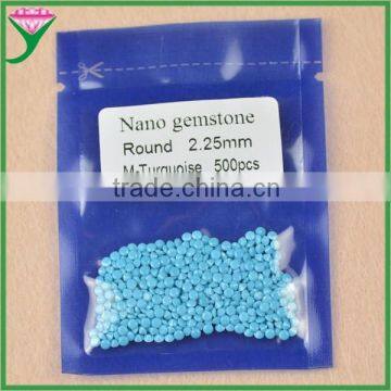 wuzhou factory wholesale tibetan rough artificial nano loose round turquoise stones for sale