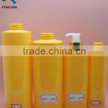 10OZ yellow plastic round lotion bottle with pump