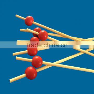 bamboo skewers with red beads