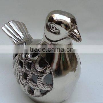 aluminium shiny polished bird sculpture