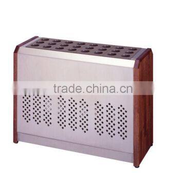 Umbrella stand for hotel made of stainless steel organizing umbrella neatly.