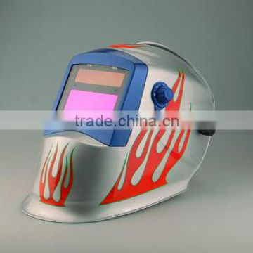 Solar powered welding helmet flames