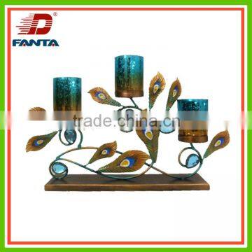 Decorative metal peacock tea light candle holder