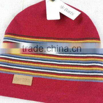 woman knitted winter hat with leather patch