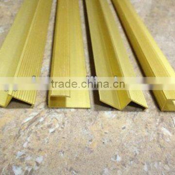 Anodized gold colored aluminum profile of decoration.