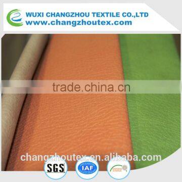 100% POLYESTER HIGH QUALITY WARP SUEDE WITH EMBOSSING AND BONDING, WITH PU ON THE SURFACE